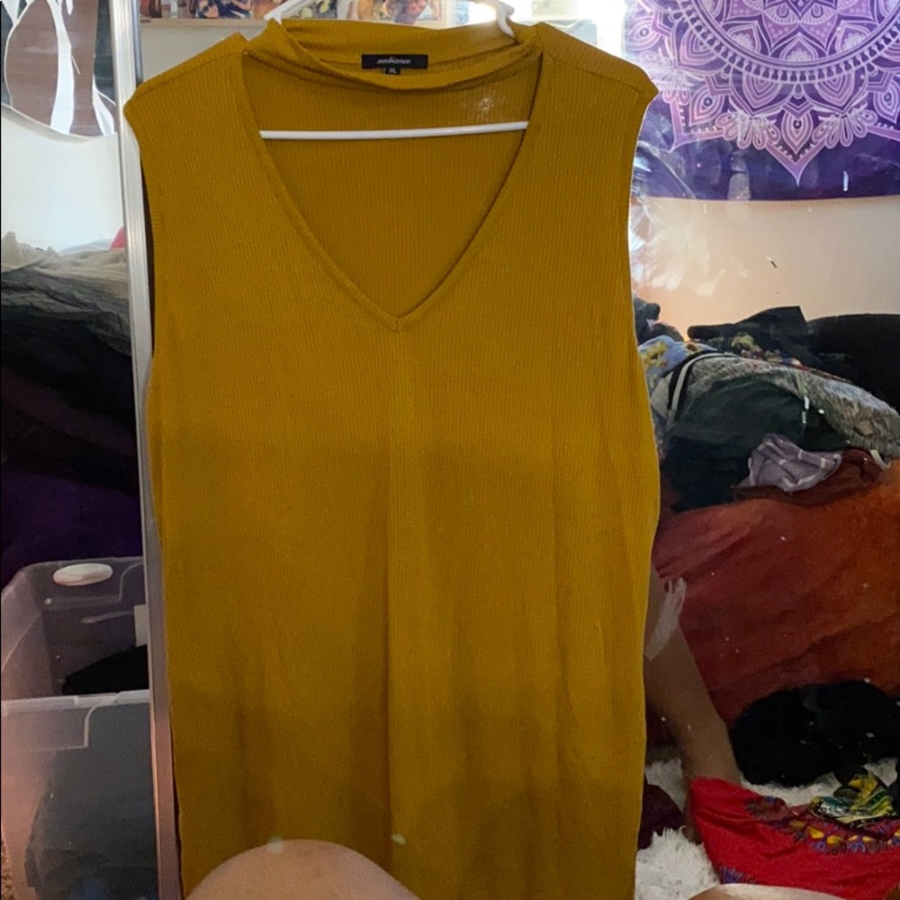 Mustard blouse.
